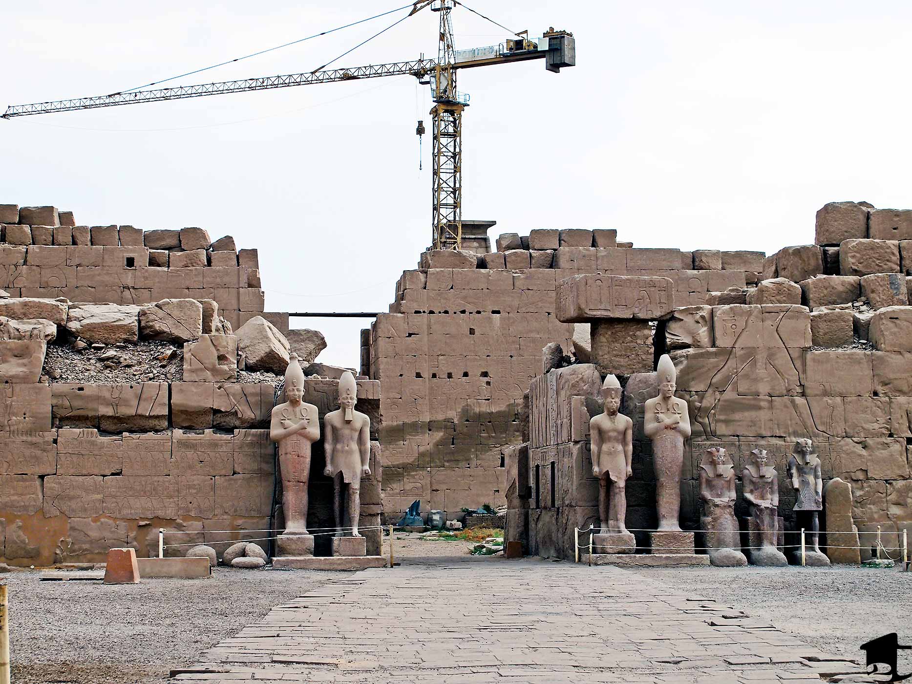 A modern-day crane restoring ancient Karnak